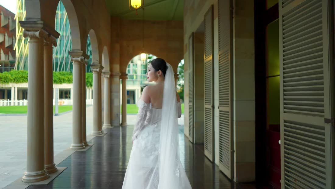 Bride in a sandstone arcade